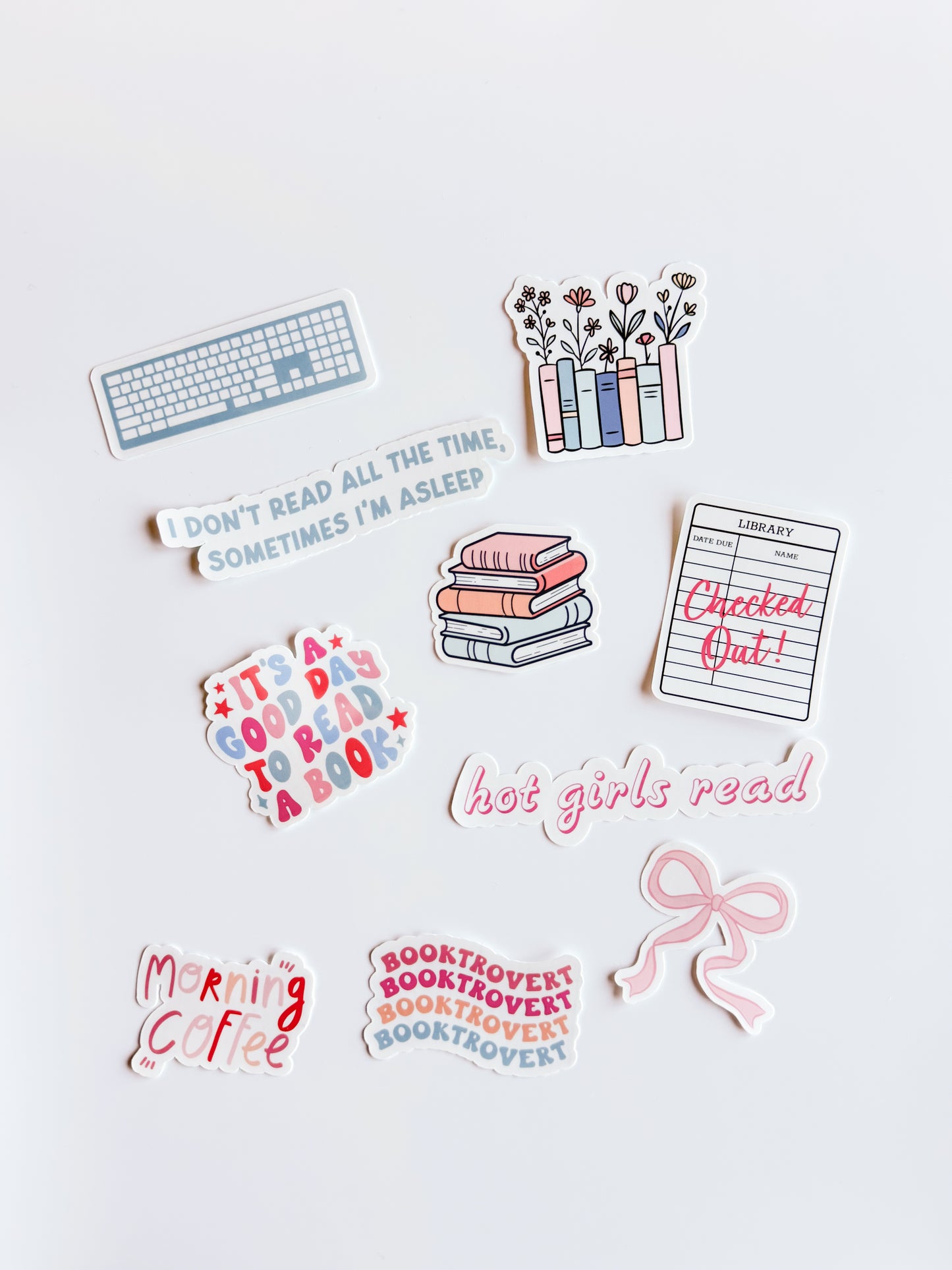 Collection of book-themed stickers on a white background