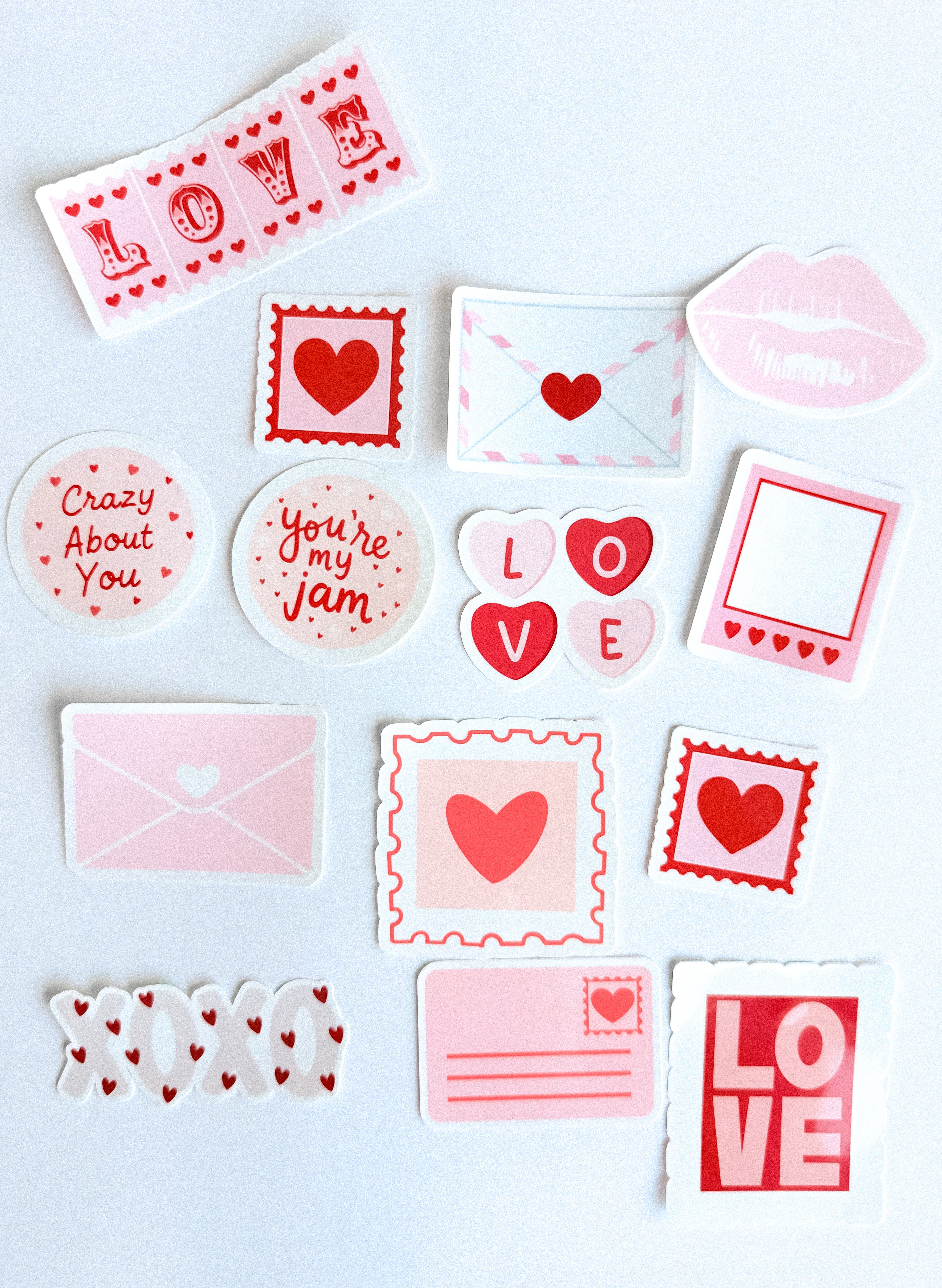 Collection of Valentine's Day-themed stickers on a light blue background