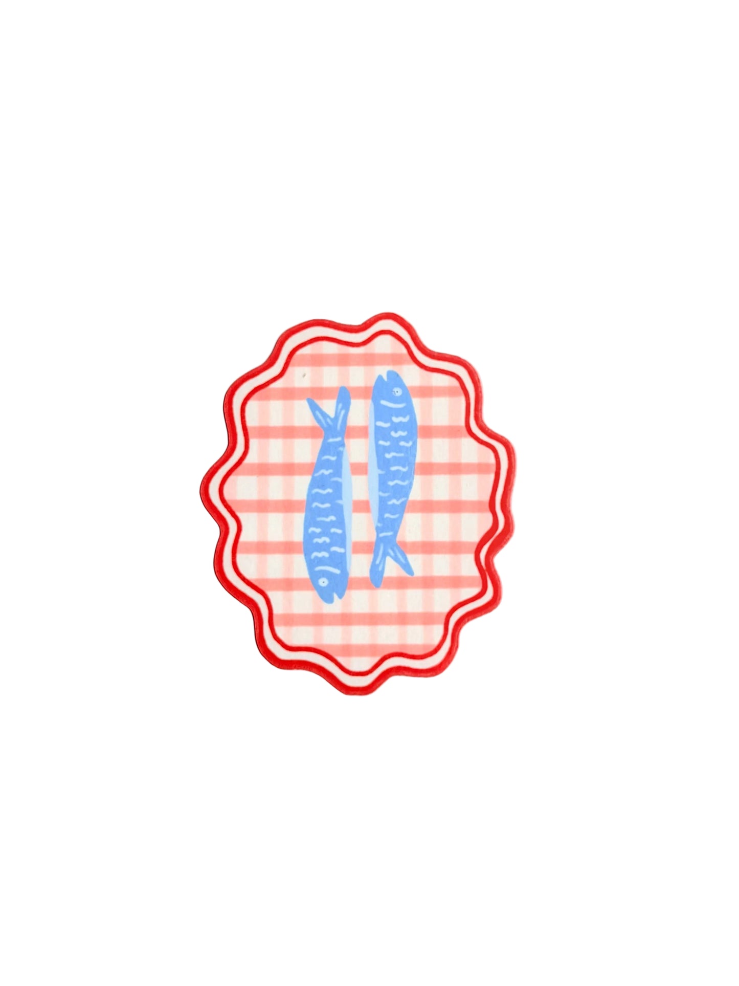 Decorative emblem with blue fish illustration on a red and white striped background