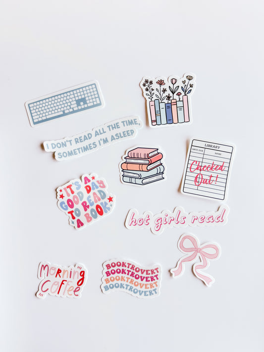 Collection of book-themed stickers on a white background